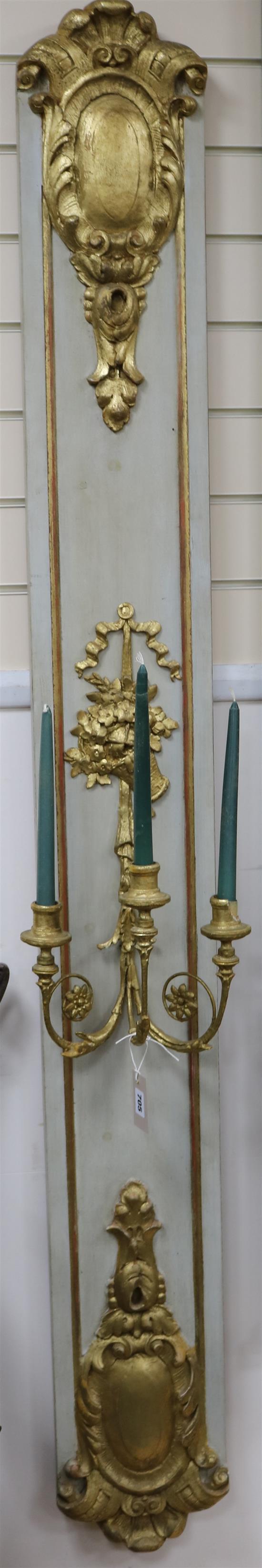 A pair of French painted and parcel gilt wall appliqués, H.185cm
